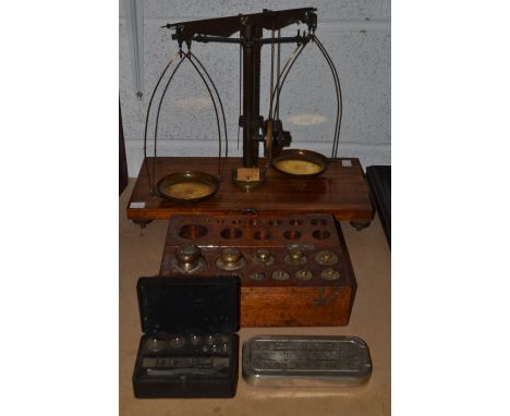 A set of Maclonith and Co , Birmingham table scales ; an oak cased part set of brass scales , another, Griffin and Taflock ca