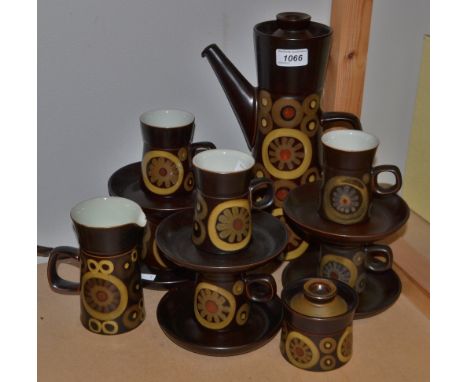 A Denby Arabesque pattern large coffee pot, six coffee cans and saucers, cream jug and sucrier