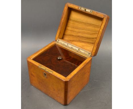 A 20th century tea caddy, plain rounded rectangular body, single internal glass lined compartment. c.1920