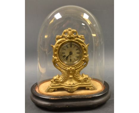 A 19th century Parker 8 day mantel clock in glass dome
