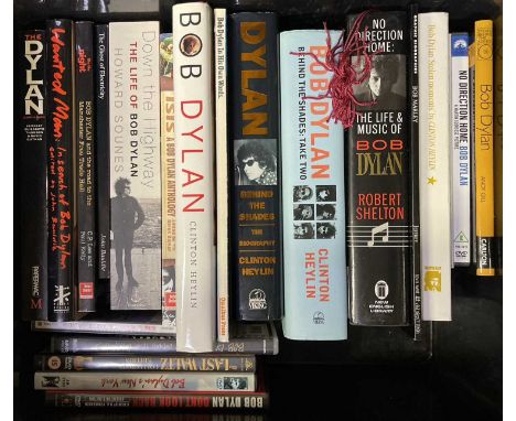 Approx 17 assorted collectable Bob Dylan books and a selection of DVDs/CDs.