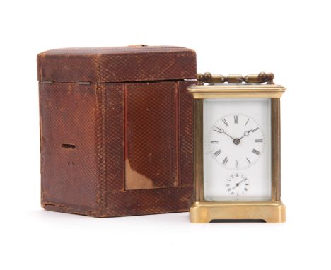 A 19TH CENTURY FRENCH BRASS CARRIAGE CLOCK REPEATER WITH ALARM the corniche case with folding handle and white enamel dial wi