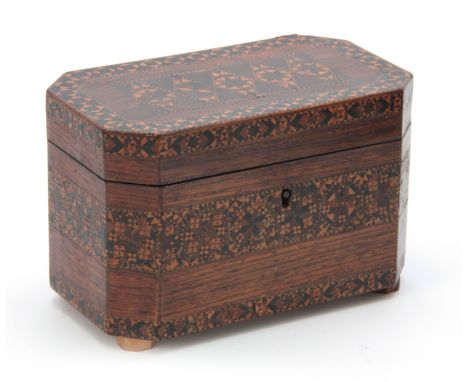 A 19th CENTURY TUNBRIDGE WARE INLAID TEA CADDY with canted corners and hinged lid opening to reveal matching tea compartments