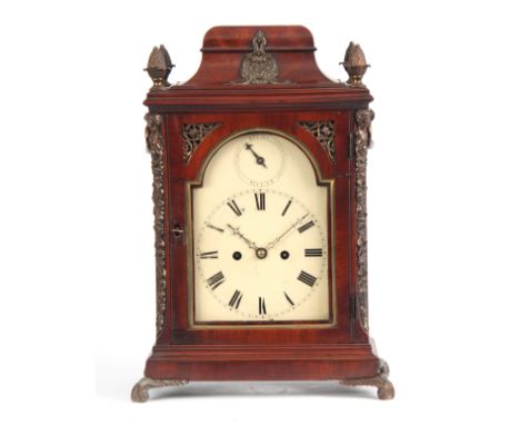 WILLIAM KIPLING, LONDON. A GEORGE III FIGURED MAHOGANY BRACKET CLOCK the bell top case surmounted by four gilt pineapple fini