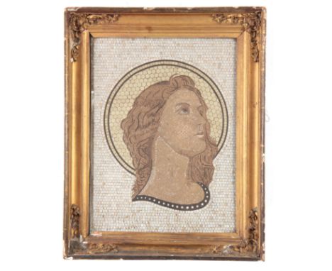 AN EARLY 19TH CENTURY MOSIAC PORTRAIT OF A YOUNG LADY - mounted in a gilt frame 39cm high 30cm wide.