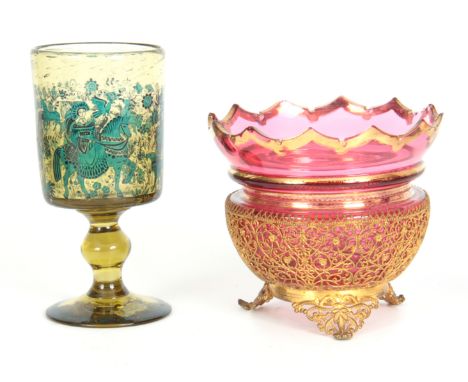 A 20TH CENTURY FINELY WORKED GILT FILIGREE OVER LAID CONTINENTAL CRANBERRY GLASS BOWL with gilt serrated edge rim and ornate 