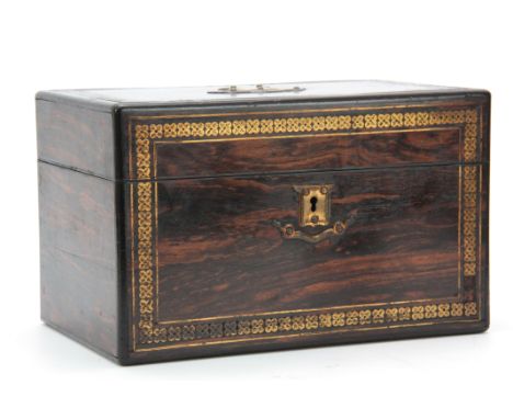 A LATE 19th CENTURY COROMANDEL AND BRASS INLAID TEA CADDY with hinged lid opening to reveal two satinwood caddies  25cm wide,