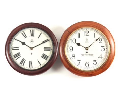 TWO 19TH CENTURY 12" WALL CLOCKS with spring-driven movements, one being an RAF clock, having 8-day spring-driven movements.