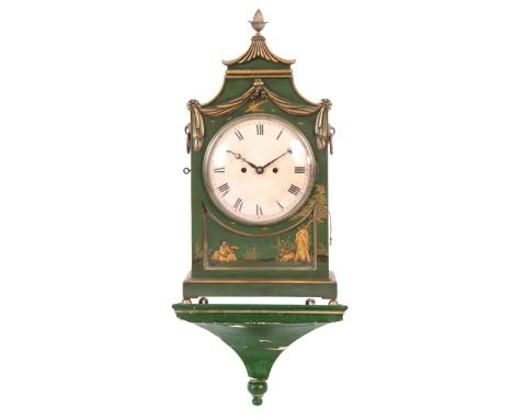 AN ENGLISH REGENCY CHINOISERIE PAGODA TOP BRACKET CLOCK the green painted case decorated with gilt figures, blossoming trees,