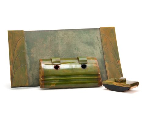 A 20TH CENTURY ART DECO CARVACRAFT PHENOLIC BAKELITE DESK SET comprising of an inkwell 6cm high 28cm wide 17cm deep, blotter 