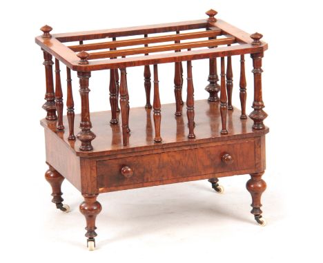 A MID 19th CENTURY BURR WALNUT CANTERBURY with turned sections above a long drawer with canted corners on turned bulbous legs