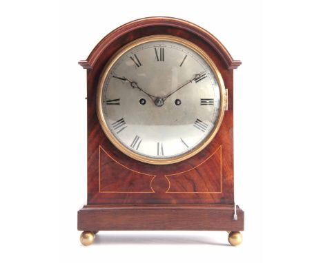AN EDWARDIAN MAHOGANY DOUBLE FUSEE QUARTER CHIMING BRACKET CLOCK the break arched case with boxwood strung inlay enclosing an