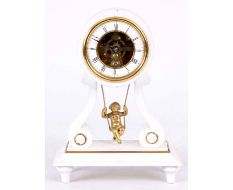 A LATE 19th CENTURY FRENCH SWINGING CHERUB MANTLE CLOCK with drum-shaped case on scroll supports enclosing a 3" porcelain cha