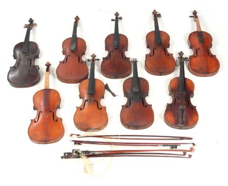 A COLLECTION OF 9 VIOLINS AND 8 VIOLIN BOWS including a branded Stainer below the button, length of back 35.7cm, and an inter