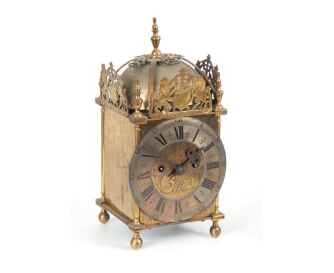 A LATE 19th CENTURY DOUBLE FUSEE LANTERN CLOCK the case surmounted by a large bell above a 7" silvered engraved chapter ring 