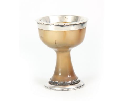 AN 18th CENTURY SILVER MOUNTED CHALCEDONY STEM CUP of mushroom colour with light brown inclusions 6.5cm high