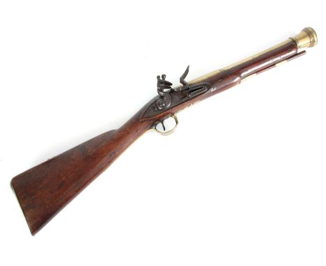 HUTCHINSON, DUBLIN. A 19th CENTURY IRISH BRASS BARREL BLUNDERBUSS the barrel stamped Dublin MF 1461 and with two proof marks,