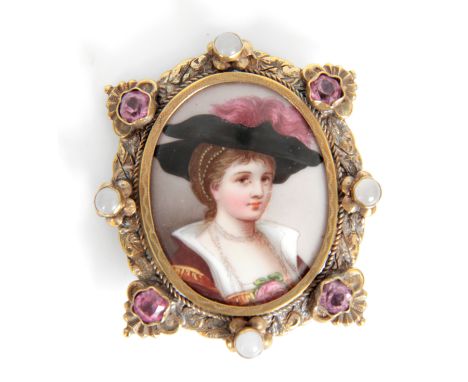 A 19TH CENTURY OVAL PORCELAIN MINIATURE PORTRAIT BROOCH with elaborate gilt metal frame set with Amethysts and Pearl flowerhe