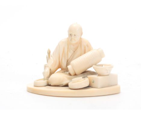 A MEIJI PERIOD JAPANESE IVORY OKIMONO modeled as a seated artisan pot maker surrounded by various pots and tools seated on an