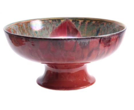 A PILKINGTON'S ROYAL LANCASTRIAN FOOTED BOWL BY GLADYS ROGERS having a red and green glaze with a yellow underside, maker's m