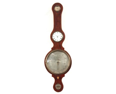 FRANCIS WEST. LONDON. A GEORGE III FIGURED MAHOGANY WHEEL BAROMETER WITH CLOCK the round top case with boxwood string inlay, 