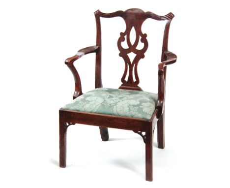 A GEORGE III CHIPPENDALE STYLE WALNUT COUNTRY OPEN ARMCHAIR with pierced shaped splat and splayed arms, drop-in seat on four 