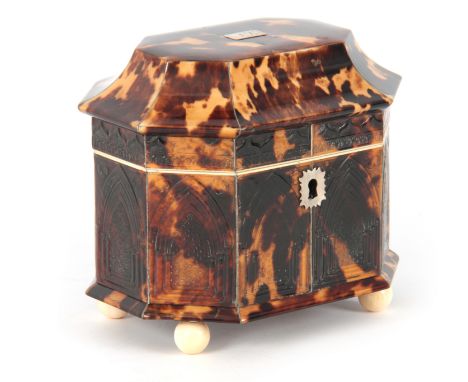 A RARE EARLY 19TH CENTURY TORTOISESHELL AND SILVER LINED PRESSED PAGODA TOPPED TEA CADDY with Gothic-style arched panels, the