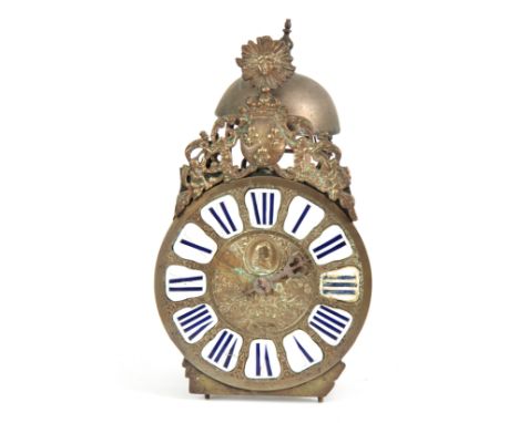 AN 18TH CENTURY FRENCH LANTERN CLOCK with embossed 8.5" brass dial with porcelain Roman numerals surmounted by crowned fleur-