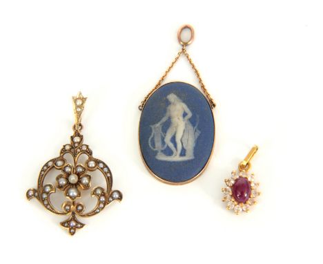 A COLLECTION OF THREE VINTAGE GOLD PENDANTS to include a 10ct gold and Wedgewood oval pendant 29mm oval, a 15ct gold and pear