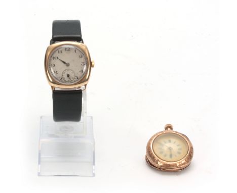 A 9ct GOLD VINTAGE WRIST WATCH having a tank shape case enclosing a silvered dial with Arabic numerals and subsidiary seconds