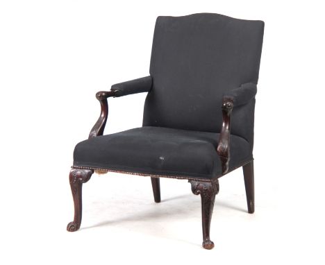 A GEORGE III MAHOGANY CHIPPENDALE GAINSBOROUGH CHAIR having upholstered shaped back, open arms with shaped leaf work carving;