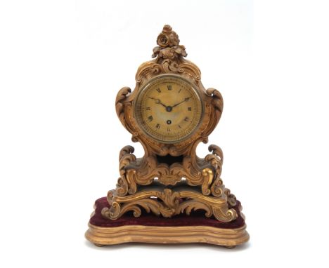 RAINGO FRES. A PARIS. AN EARLY 19th CENTURY FRENCH ORMOLU TIMEPIECE MANTEL CLOCK standing on a gilt plinth, the rococo style 