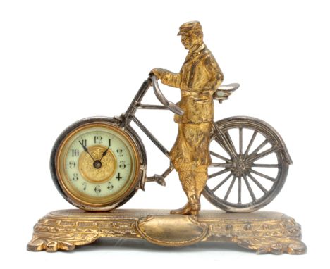 A LATE 19th CENTURY ENGLISH NOVELTY DESK CLOCK formed as a gilt well-dressed gentleman stood next to a silver-plated bicycle 