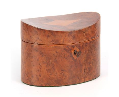 A 20TH CENTURY OVAL INVERTED TOP BURR YEWOOD TEA CADDY having satinwood diamond-shaped inlay on the lid and shield-shaped esc