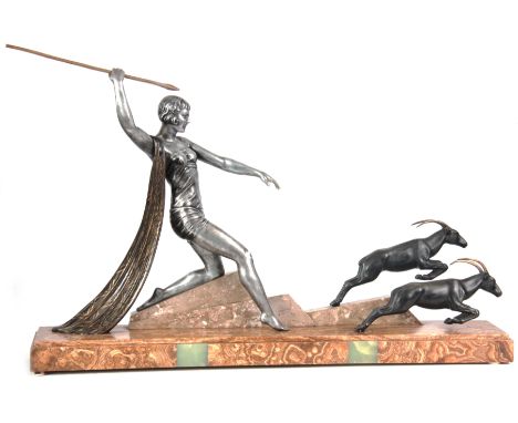 AFTER J. DAUVERGNE. A LARGE FRENCH ART DECO PATINATED METAL, TRAVERTINE AND ONYX GROUP OF DIANA HUNTING TWO IBEX  84cm wide, 