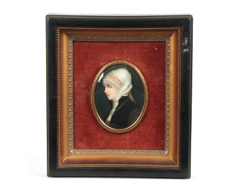 A 19TH CENTURY ART NOUVEAU STYLE PORCELAIN MINIATURE PORTRAIT depicting a young Lady dressed in classical clothes 9cm high 7c