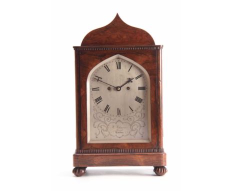 W. JOHNSON, STRAND, LONDON A MID 19th CENTURY ROSEWOOD BRACKET CLOCK the case of rectangular form with shaped pediment enclos