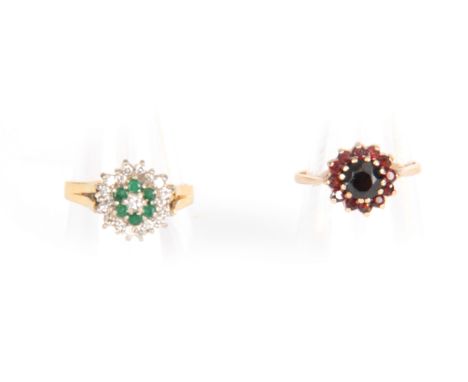 A 14CT GOLD EMERALD AND DIAMOND CLUSTER RING app. 5.6g; Together with A 9CT GOLD DARK AND LIGHT RUBY CLUSTER RING app. 2.4g (