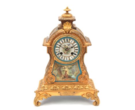 A LATE 19th CENTURY FRENCH ORMOLU AND SEVRES STYLE PORCELAIN PANELED MANTEL CLOCK having acanthus leaf mouldings, the front h