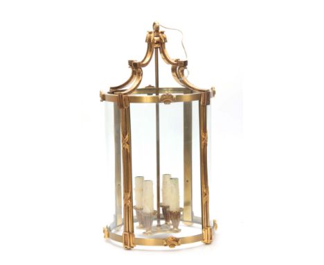 A 20TH CENTURY BRASS REGENCY STYLE CIRCULAR HANGING HALL LANTERN 53cm high 30cm diameter.