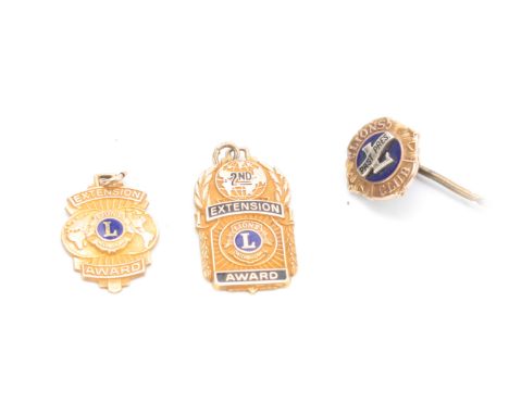 A COLLECTION OF 10CT GOLD AND ENAMEL LIONS CLUB PENDANTS app.11g (3)