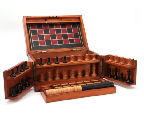 A VICTORIAN MAHOGANY GAMES COMPENDIUM WITH JAQUES MONOGRAM having a hinged fold-out front and lid enclosing a fitted chess se