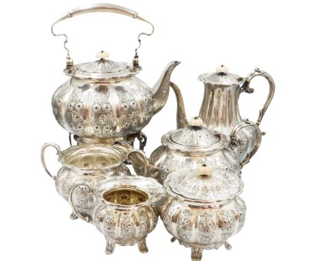 English Sterling Silver Melon Shaped Tea Set, Six Piece. Hand Chased with bone finials. One finial darkened with age. Approx 