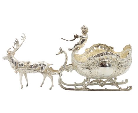 Italian 800 Silver Table Ornament, 8 OZT. Sterling silver table ornament, reindeer pulling sleigh with cherub sitting atop. A