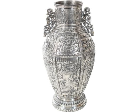 Exquisite Chinese silver urn with scroll handles and exterior scene design. Marked on the underside. Approximately 33 OZT. Si