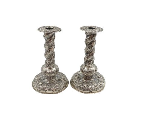 Pair of early Continental Silver Repousse Candlesticks 19th C. Size: 5 x 5 x 7 1/2 in. 1279