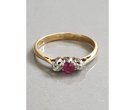 18CT GOLD DIAMOND AND RUBY THREE STONE RING 2.2G SIZE M1/2