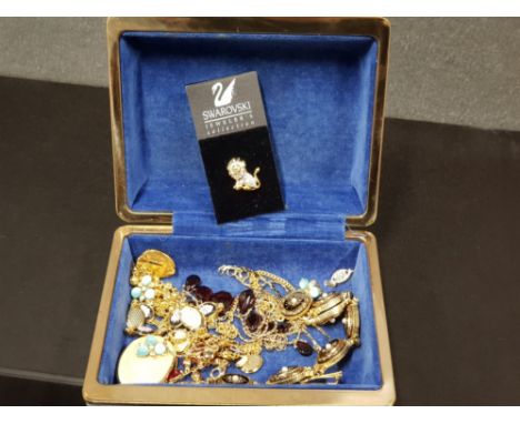 BLUE JEWELLERY BOX CONTAINING ASSORTED GOLD PLATED JEWELLERY AND SWAROVSKI LION PIN