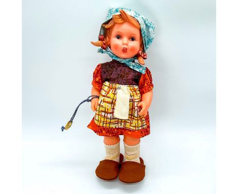 Goebel medallion included with this vintage doll. Dressed in real cloth clothing, vinyl head and body with Goebel backstamp o