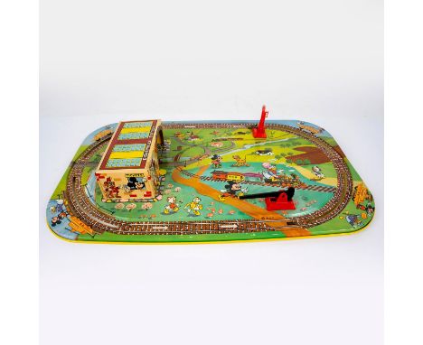 Box with dimensions 22"L x 13.5"W x3.5"H. Nicely illustrated box contains track only. 1950s. The colorful and nicely illustra